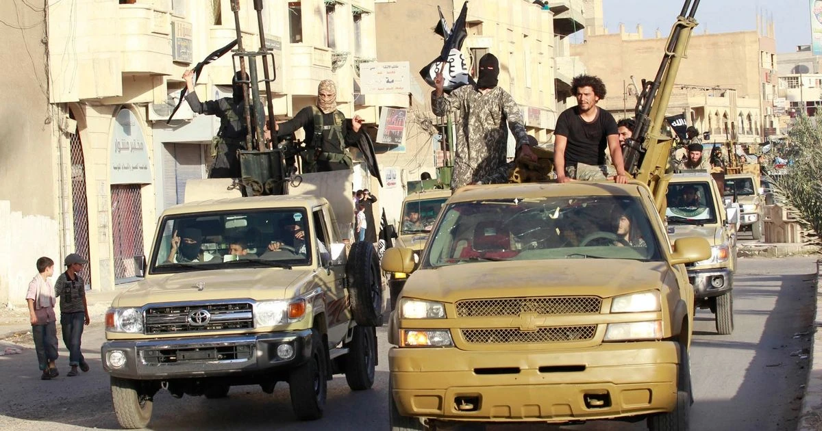 IS militants behead more than 50 men and children on football pitch then scatter bodies