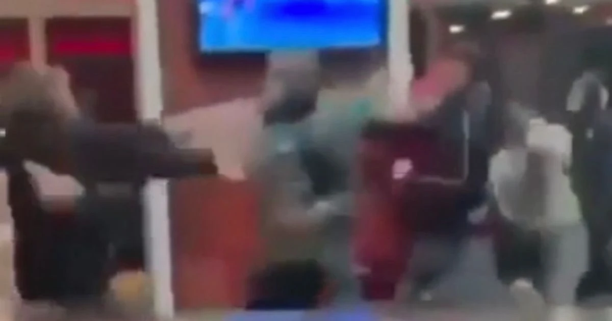 Footage shows '30-strong' Burger King brawl as yob wields hammer and tables fly