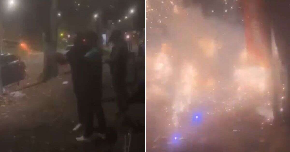 Moment man almost blows himself up after lighting firework in bare hand