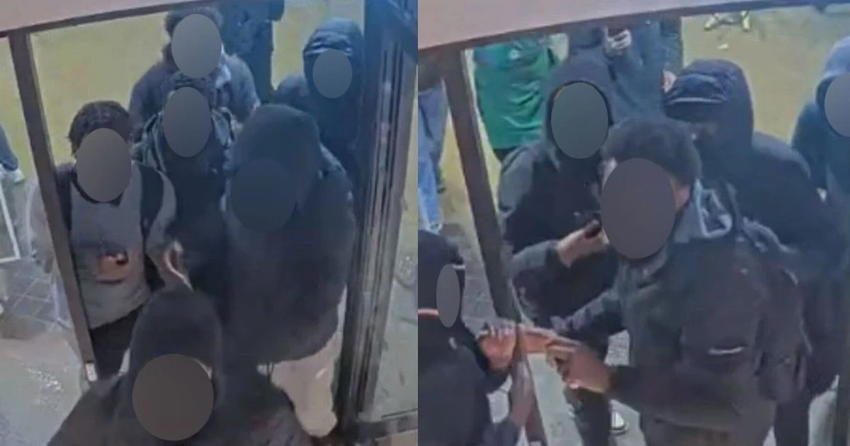 'Disorder' erupts in Starbucks with chairs thrown in the chaos as cops arrest two