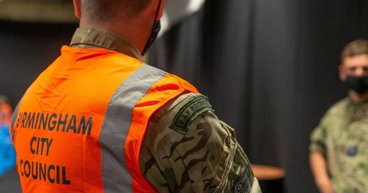 Ranting man shouts abuse at 'disgusting' military distributing coronavirus tests