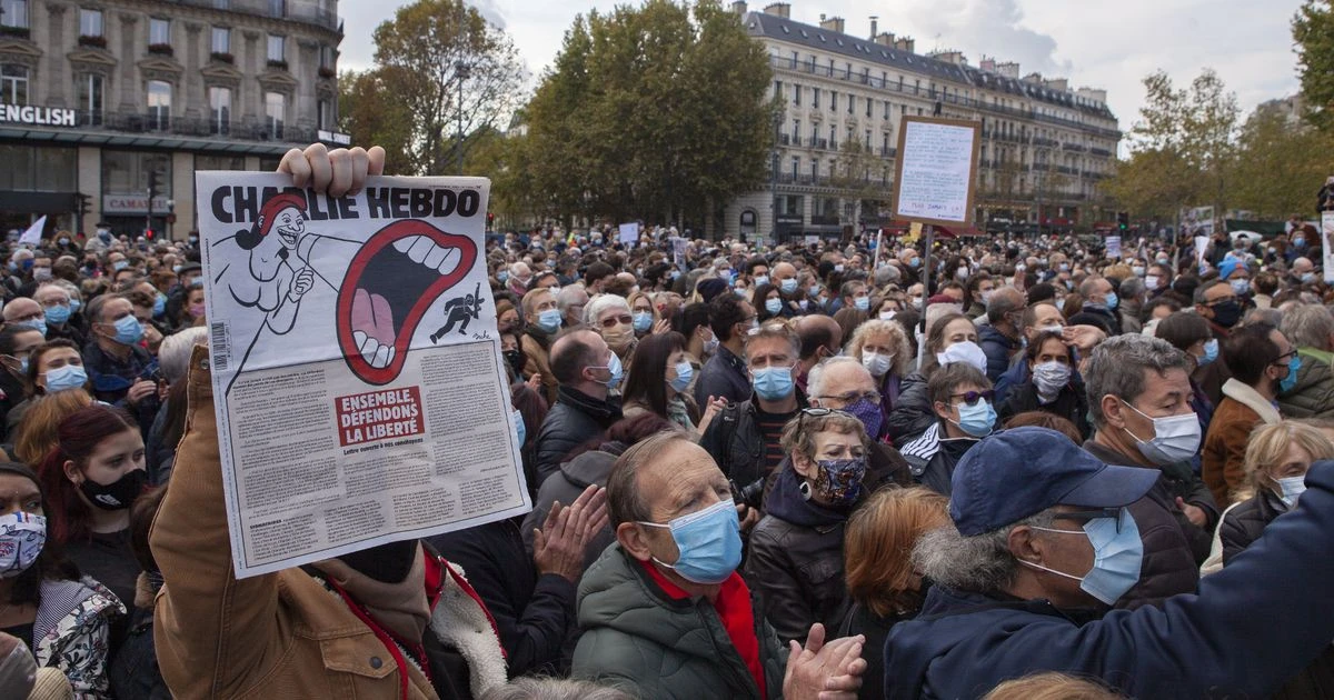 Thousands protest brutal beheading of Paris teacher by terrorist 'who filmed killing'