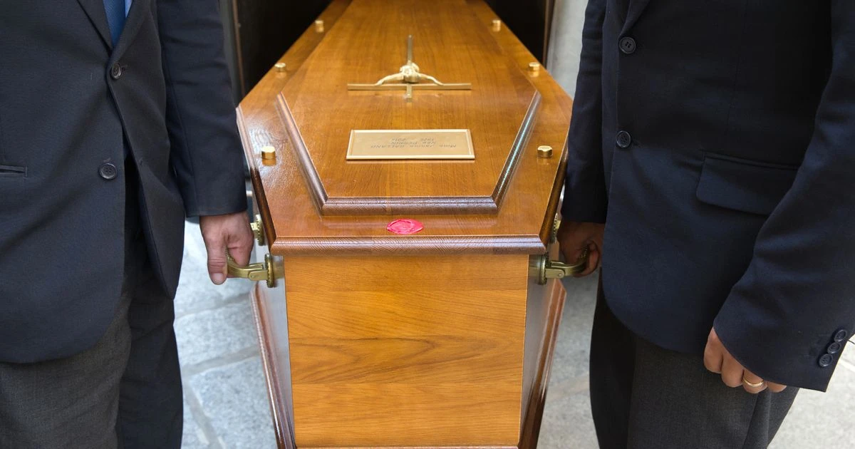 Grieving family unable to pay for burial 'left with body on floor' as coffin confiscated