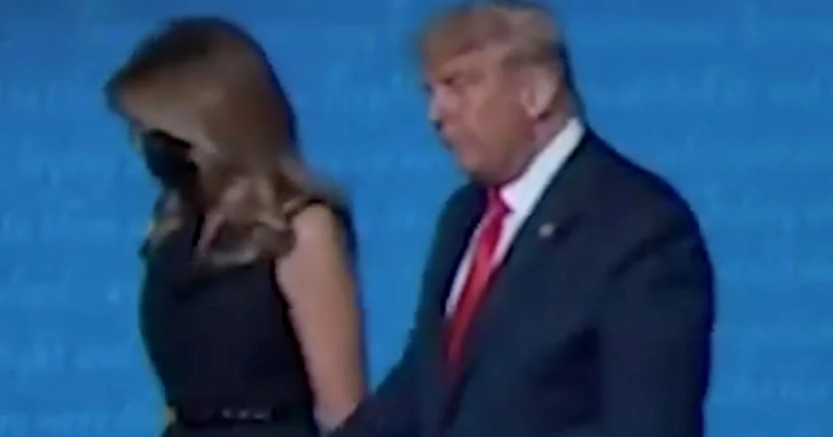 Moment Melania Trump pulls hand away from Donald at end of US Presidential debate