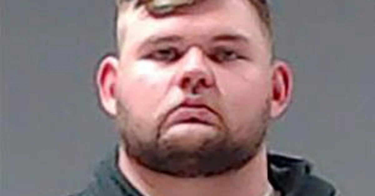 Policeman on murder charge for 'shooting black man who tried to shake his hand' is fired