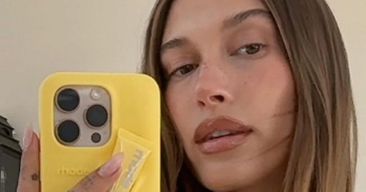 Hailey Bieber made a new hands-free way to hold the Rhode lip balm - but fans are divided