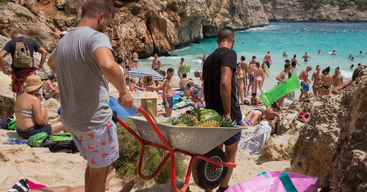 Balearic Islands ban influencers after cove is swamped by 4,000 tourists