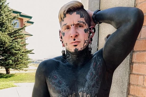 'World's most tattooed dad' has savage response to troll who mocked his face inkings