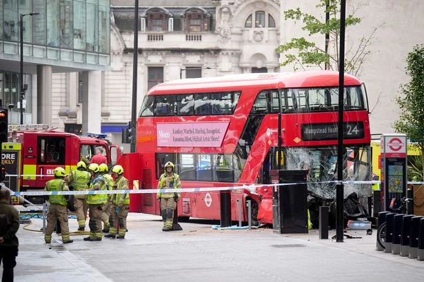 BREAKING 'Multiple injured’ as double-decker bus mounts path outside London train station