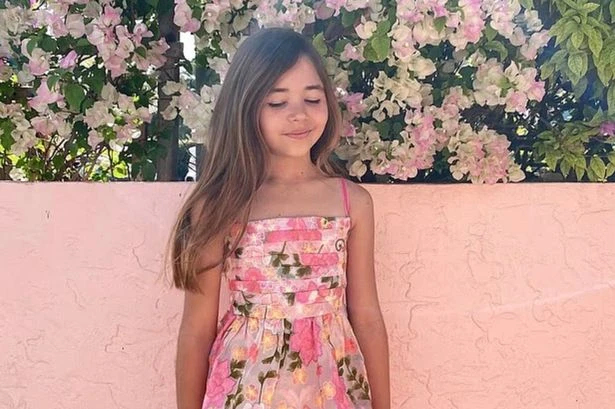 Huge 8ft shark leaves girl, 9, covered in blood with hand hanging off in horror attack