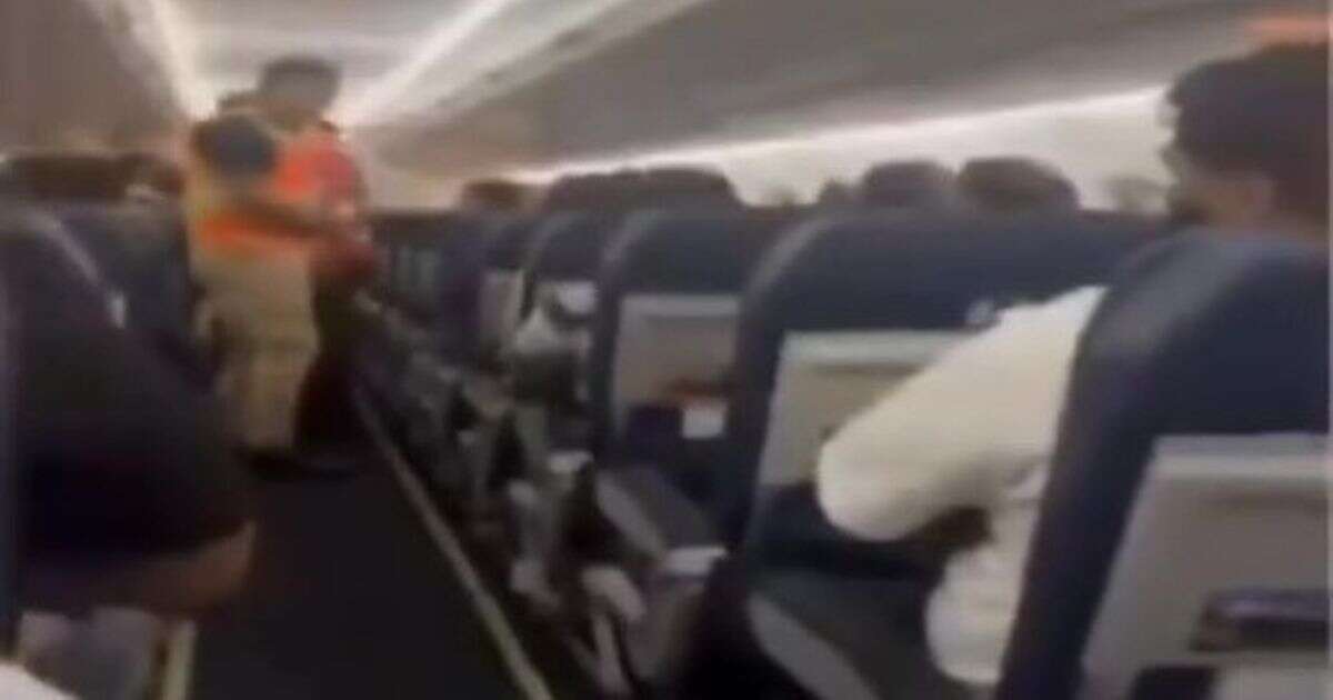 Passenger 'pulls gun out on plane and threatens to kill' before heroic crew step in