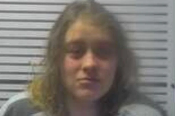 'Totally naked' woman arrested after being spotting driving car 'erratically'