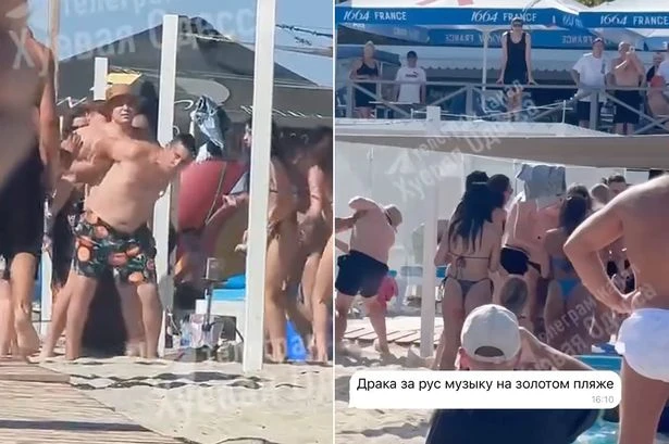 Bikini-clad beach brawl after group started playing Russian music in war torn Ukraine