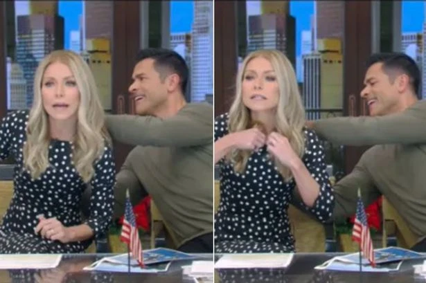 Kelly Ripa suffers major wardrobe malfunction live on air as Mark Consuelos steps in