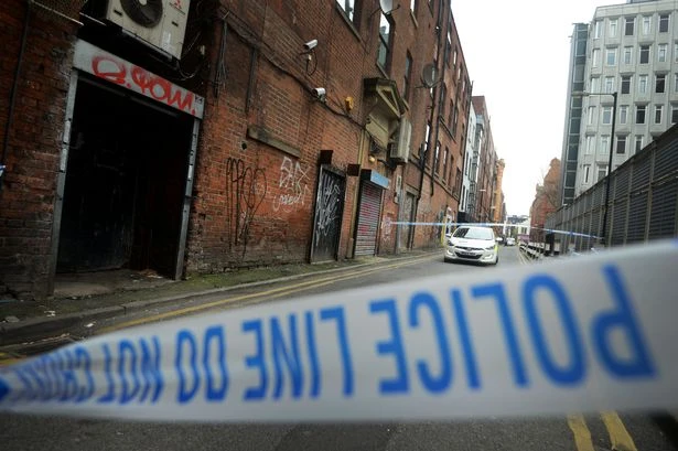 BREAKING Man 'fighting for his life' after being found in Manchester city centre as police tape off area