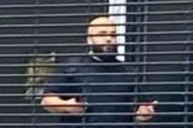 BREAKING First image of suspected synagogue terrorist pictured wearing 'suicide belt'