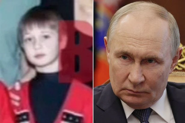 Putin's 'secret son' revealed as he's caught on camera during public performance