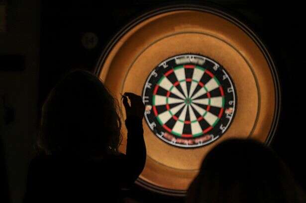 Scientists try to find cure for rare 'dart stopping' condition only darts players get