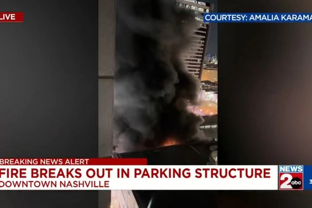 Multi-story carpark collapses as vehicles explode in roaring fire
