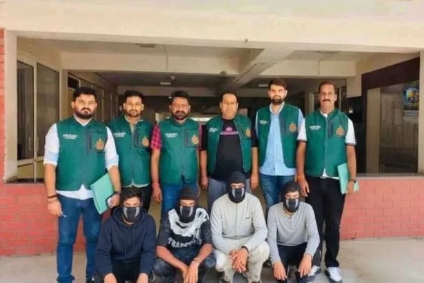 Police arrest terror gang planning major attack before posing for odd arrest snap