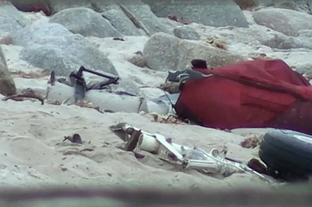 Horror as three dead after plane crash into sea just metres from the shoreline