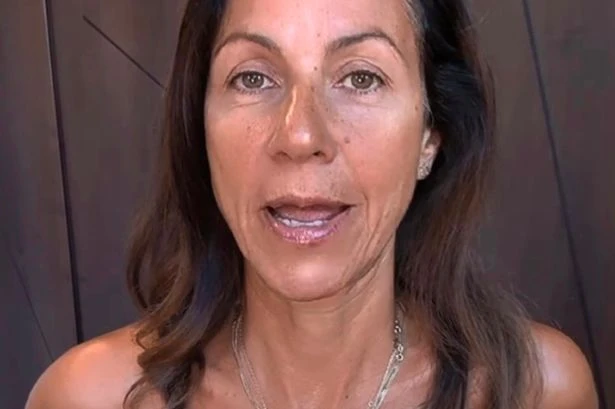 Topless Julia Bradbury films breast implants and issues 'life-changing' message