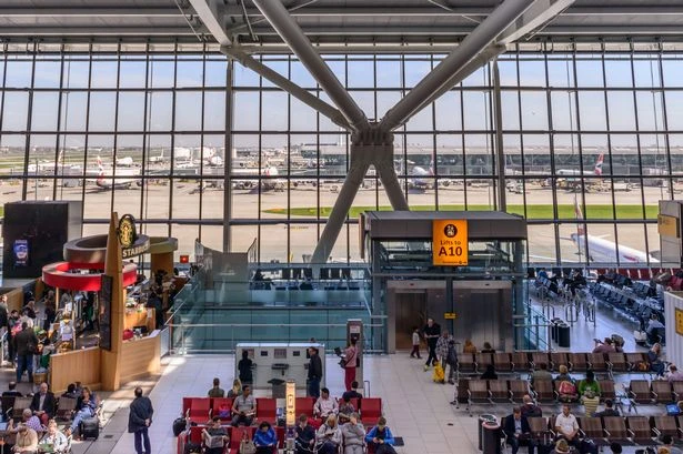 Heathrow Airport chaos as area closure sees 'people running with luggage in the roads'