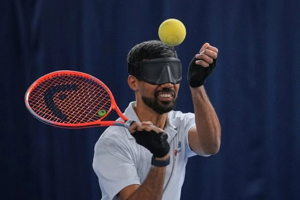 Blind Brit with genetic eye disease is world No1 who 'dominates' game