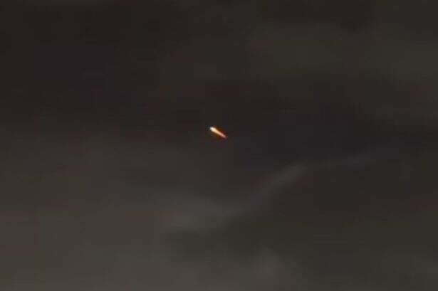 Disney World mystery as 'glowing red' UFO spotted by confused guests at Florida park