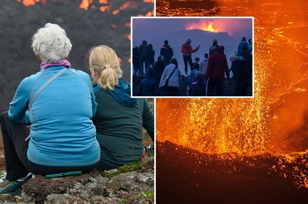 Tourists ignore warnings to marvel at bubbling lava as Icelandic volcano erupts