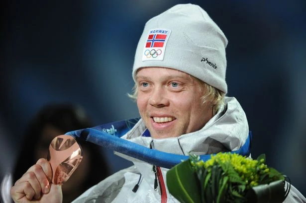Olympic hero, 49, struck by lightning and dies on holiday as wife mourns 'enormous loss'