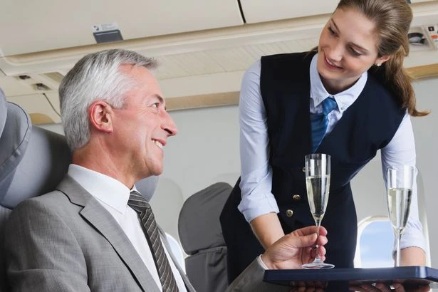Drunk air hostess ‘lifted up top’ and told worker to 'have a go on these funbags'