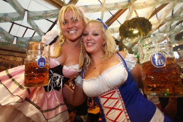 Oktoberfest kicks off in boozy style as beers flow like 'golden oil' in Germany