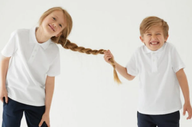 M&S accused of 'promoting violence against women' as girl's hair is pulled in photo