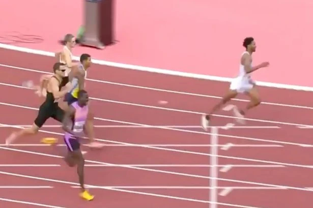 Athlete wins 400m hurdles race despite penis falling out of tiny shorts after going commando