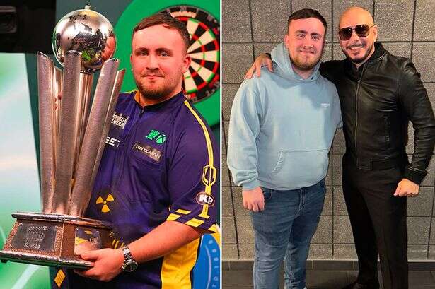 Luke Littler poses with rap legend who inspired darts teen as mystery message explained