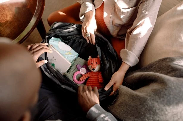 Glam hospital bags are the new trend among expecting mums - here's what they're packing
