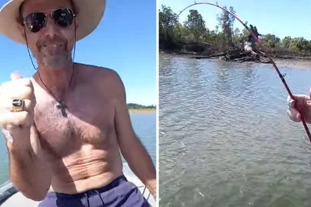 Stunned fishermen spot something snagging on line and reel in fearsome 2-metre creature