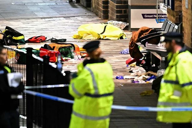 Train stabbings witness saw person 'hanging out train door bleeding' after horror attack