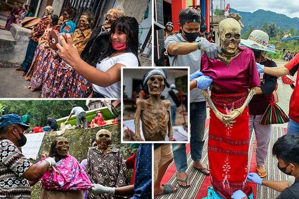 Eerie 'Day of the Dead' tradition sees loved ones exhumed as families dress them up