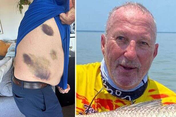 Ian Botham rescued from crocodile and shark infested waters after plunging in headfirst