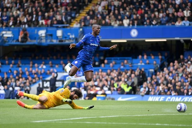Alisson avoids 'stonewall' red for 'disgusting tackle' as Chelsea star ruled offside