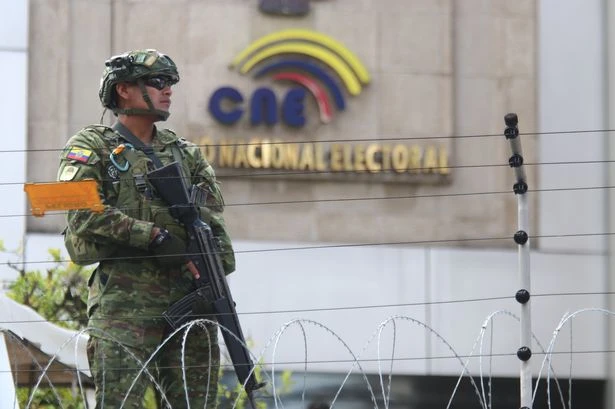 Five dead and girl, 2, injured as gunmen open fire on group watching football match