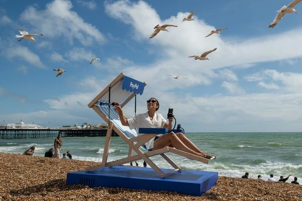 New seaside deckchair makes shopping and scrolling easier for beachgoers