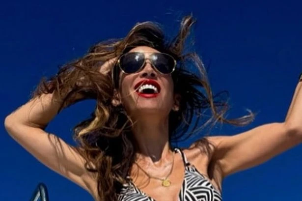 Myleene Klass strips down to skimpy string bikini to flaunt killer curves
