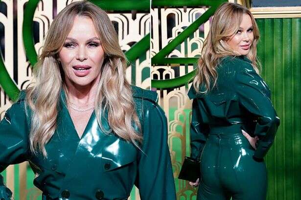 Amanda Holden squeezes into skintight green latex jumpsuit at Wicked premiere