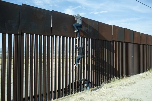 Trump orders Southern US border to be painted black so it's too hot for migrants to climb