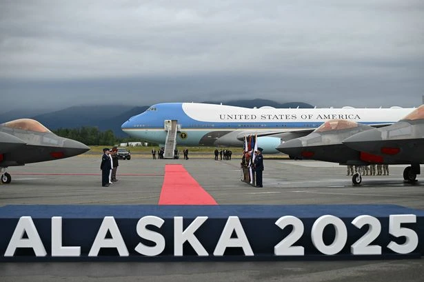 Putin gets 'red carpet' treatment as he lands in US for first time in 10 years to meet Trump