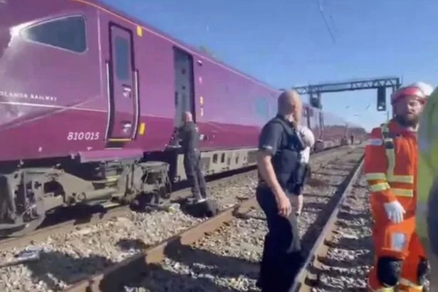 Two trains smash into each other in Bedford as passengers 'covered in blood'