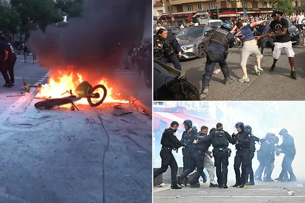 PSG fans clash with riot police and set fires as Arsenal lose final